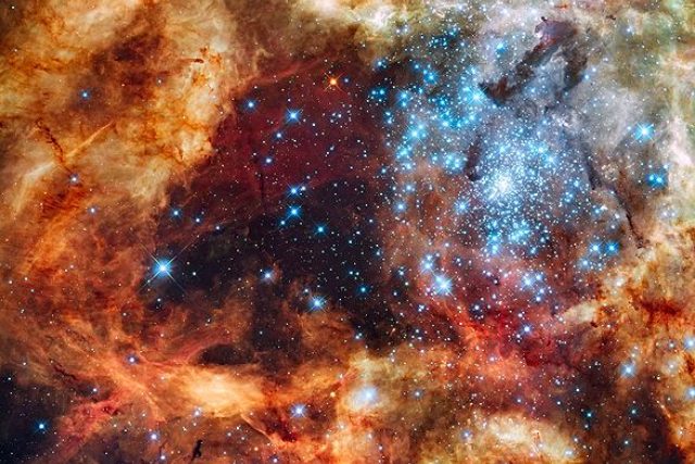 Hvězdokupa R 136 v mlhovině Tarantule ve Velkém Magellanově mračnu | foto: NASA,  ESA,  F. Paresce,  R.O'Connell a Wide Field Camera 3 SOC