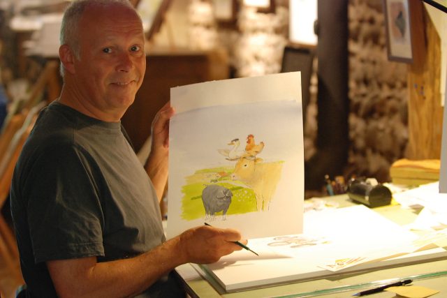 Anglický kreslíř kreslí obrázky z Tour de France | foto: Jan Šmíd,  Český rozhlas